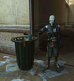 An image of John Dudman doing loyality test to new arrivals of City 17. The test consist of dropping an empty soda can and asking for the citizens to pick it up, and then throw it back to the garbage bin.